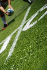 橄榄球团体椭圆形体育场运动员游戏球赛挑战胜利运动气球背景图片