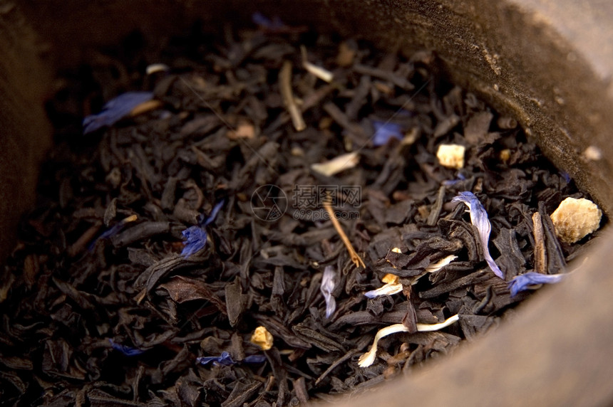 干茶茉莉花早餐叶子仪式洋甘菊玻璃液体宏观食物金子图片