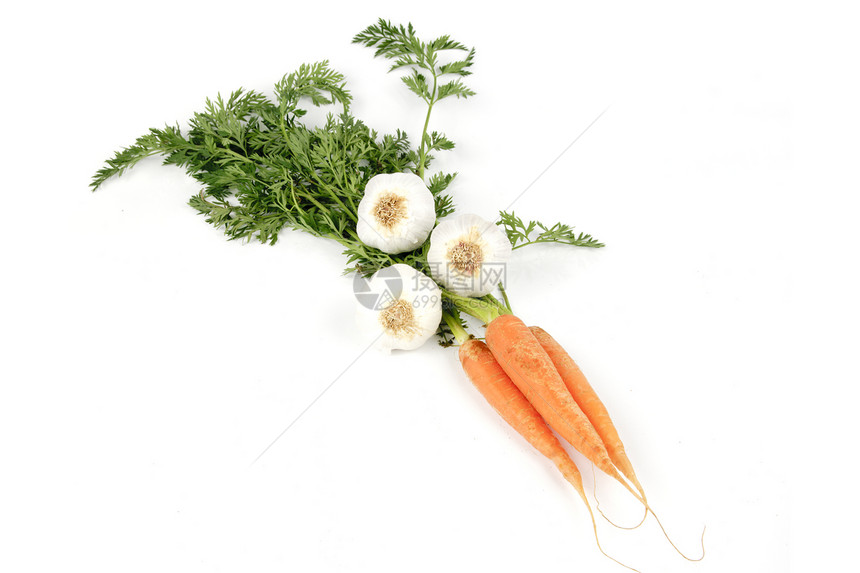 胡萝卜和大蒜农场收成蔬菜沙拉红色橙子绿色食物叶子饮食图片