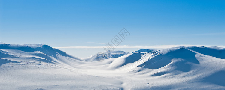 白雪山地全景白色季节性蓝色风景晴天季节山脉天空越野高清图片