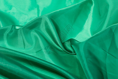 绿绿色纤维折叠材料织物褶皱纺织品背景图片