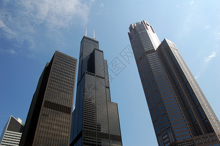 现代摩天大楼玻璃窗户刮刀商业风景蓝色反射晴天建筑办公室背景图片