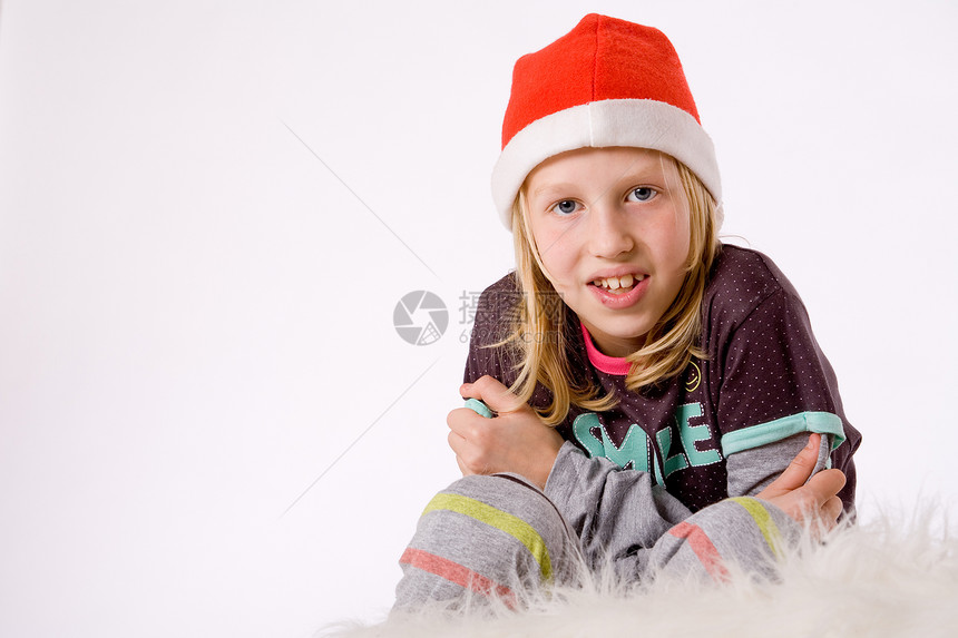 寒冷的圣诞节孩子假日睡衣庆典女孩眼神金发传统童年图片