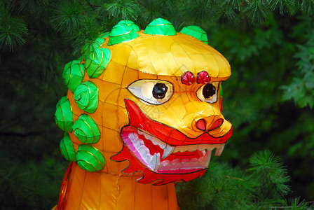 中国龙 彩色绿色历史性神话文化遗迹节日面具橙子宗教红色背景图片