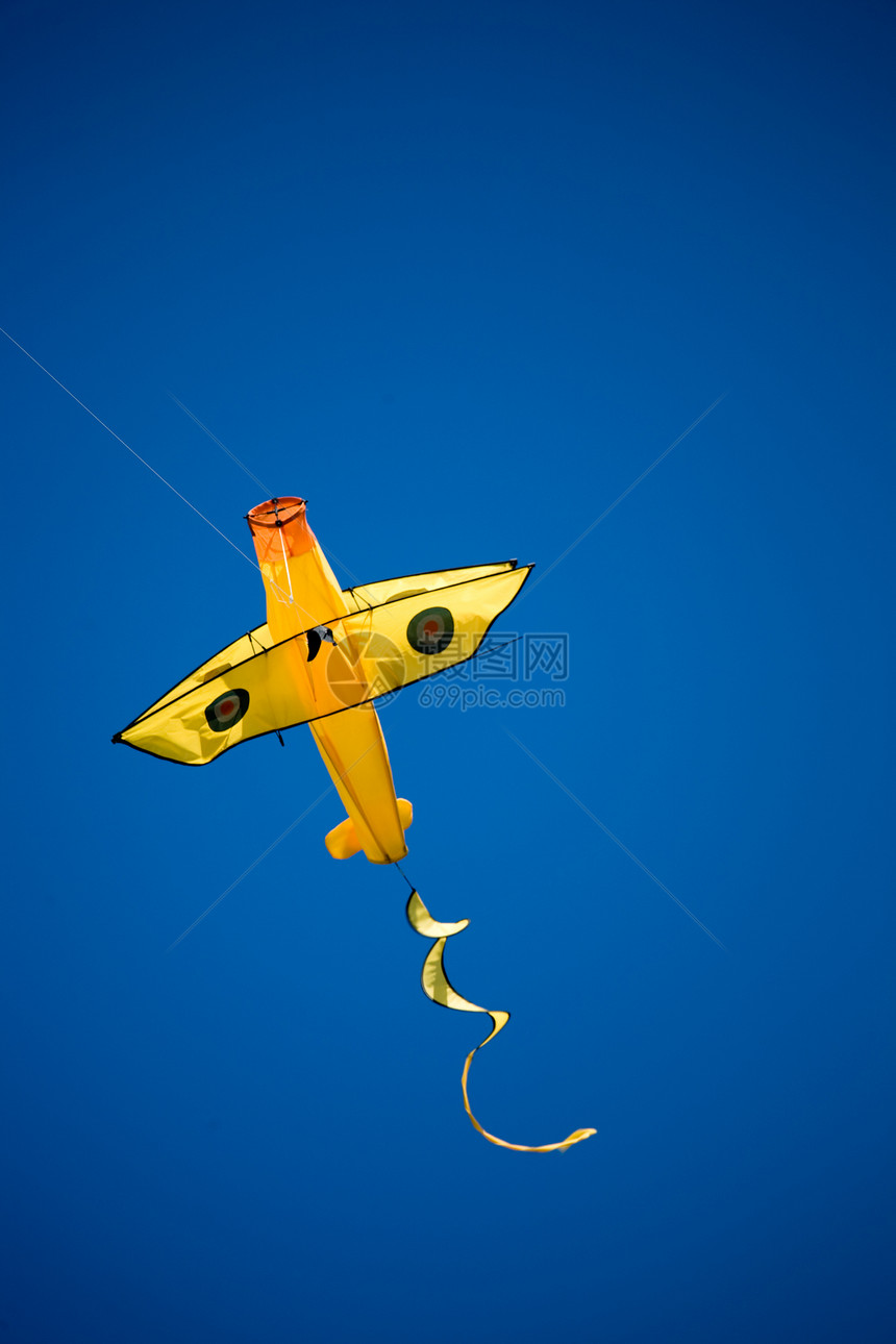 风声喜悦天空风筝闲暇玩具黄色图片