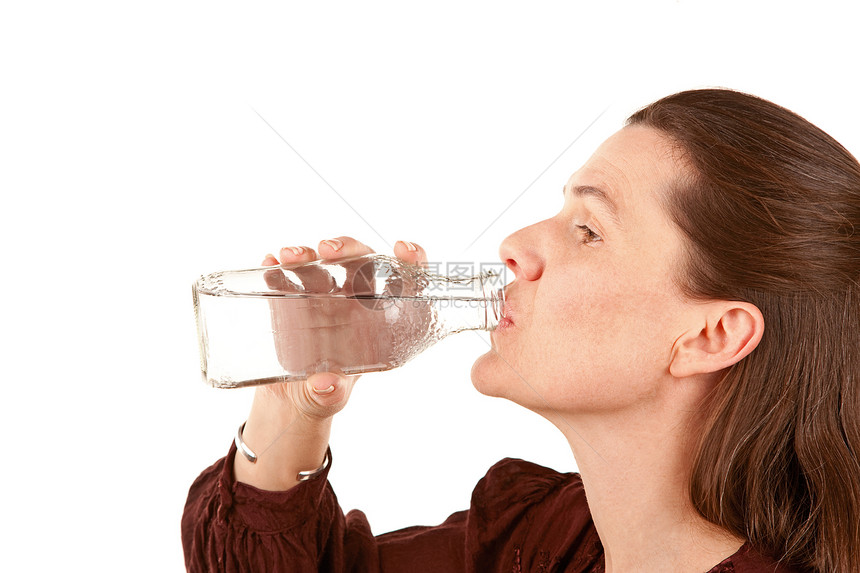 妇女饮用水成人玻璃女性饮料瓶子白色图片
