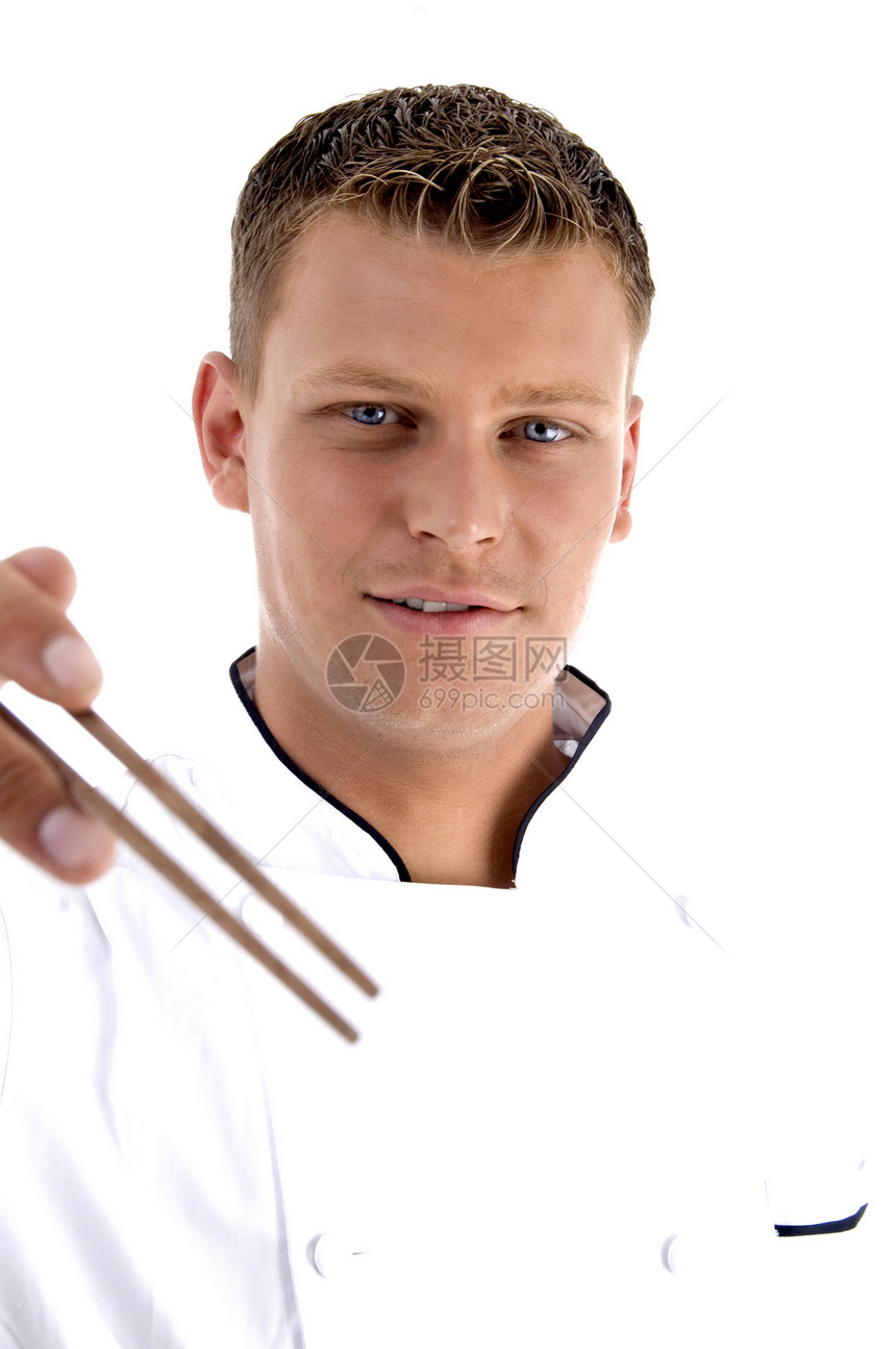 英俊的厨师拿着筷子图片