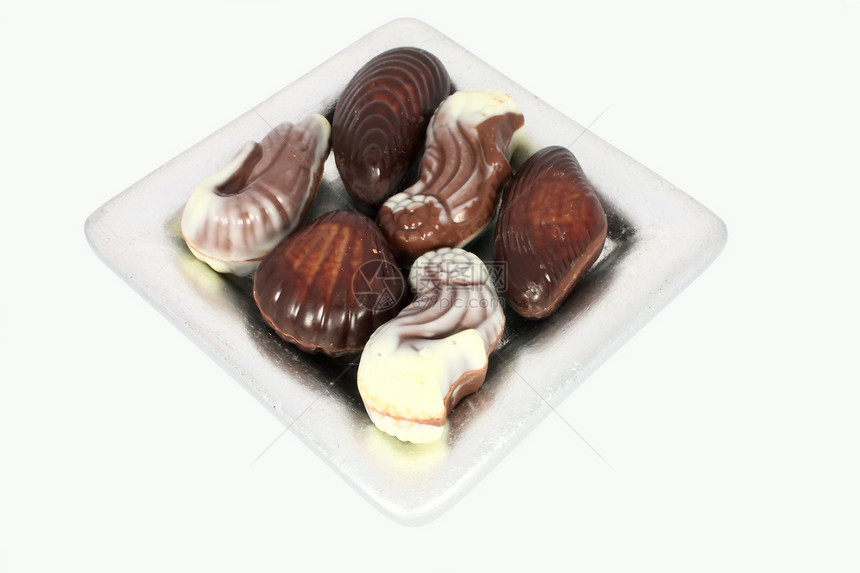 甜甜巧克力贝类贝类贝壳甜点食物小吃棕色白色美食糖果图片