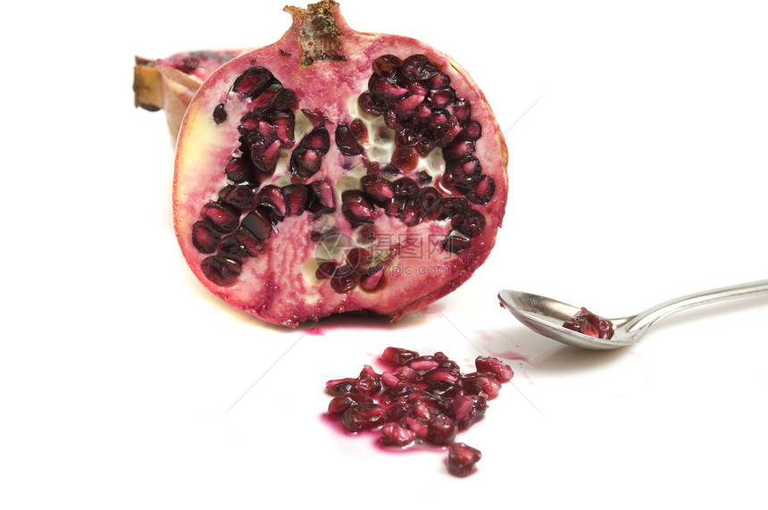 多汁的石榴茶匙食物种子生活水果情调白色甜点红色营养图片