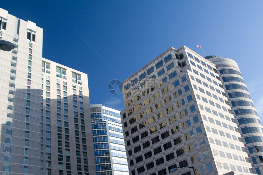 高楼现代建筑建造墙壁天空窗户公寓地标办公室城市金属玻璃图片