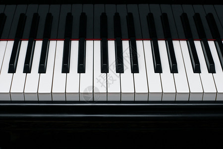 钢琴键乐队古典音乐歌曲象牙乌木笔记音乐音乐会白色黑色背景图片