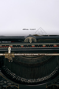 年度报告写作键盘商业新闻业按钮记者古董打字稿打字机手稿背景图片