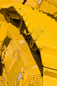音轨机器推土机挖掘机工具机械黄色背景图片