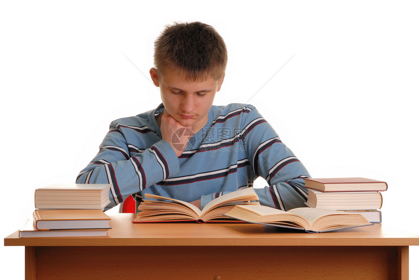 图书馆中的男孩意义教育男性阅读桌子男生图书学习学校白色图片