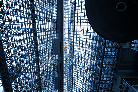 京雄城际铁路现代火车站的建筑结构金属购物中心阳光铁路商业城市玻璃蓝色建筑学车站背景
