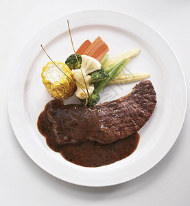 牛排美食家牛肉状态总理餐厅晚餐蔬菜土豆用餐服务高清图片