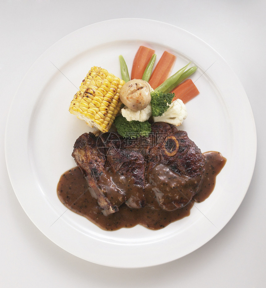 牛排美食用餐蔬菜骨头晚餐食物餐厅盘子玉米羊肉图片