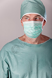男性外科医生医疗男人手术灰色绿色卫生面具保健药品背景图片