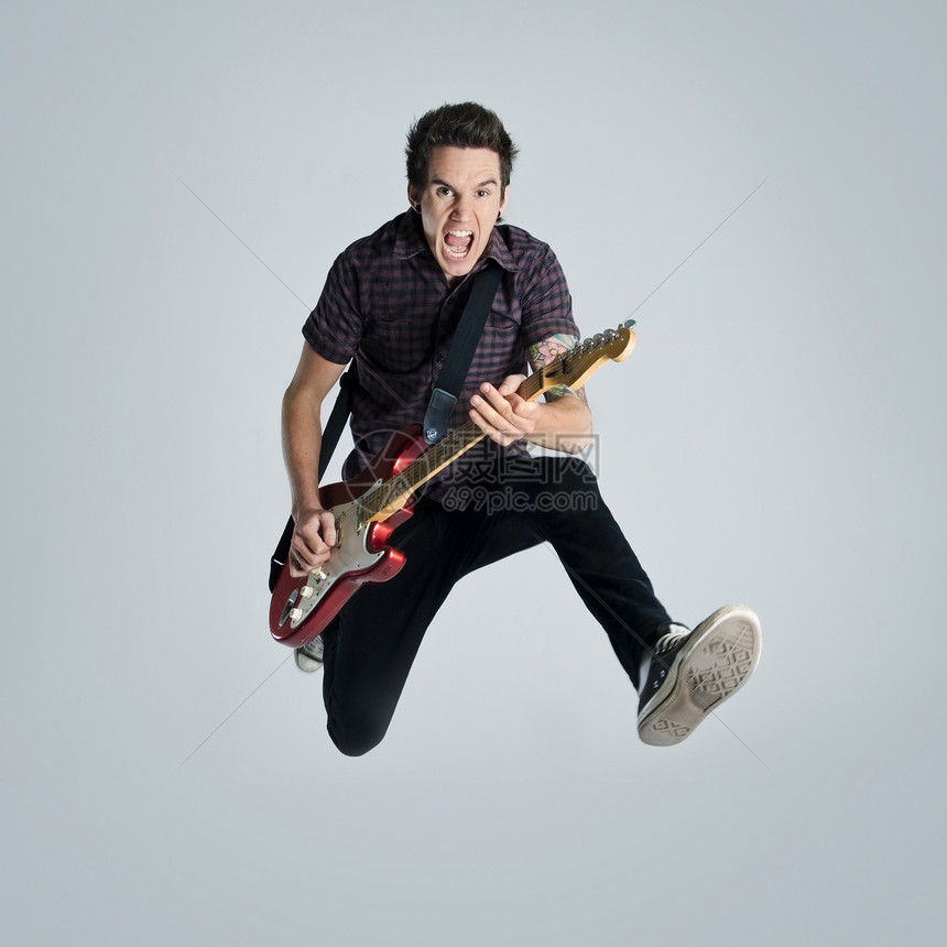 摇滚吉他玩家星星吉他手音乐家独奏头发歌曲乐趣男人图片
