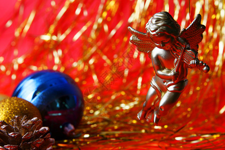 圣诞节装饰品庆典金属蓝色装潢红色白色背景图片