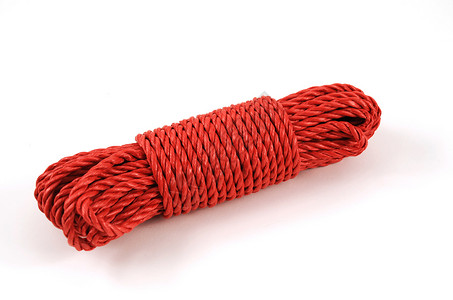 红绳红色细丝领带编织线程尼龙线圈棉布环形背景图片
