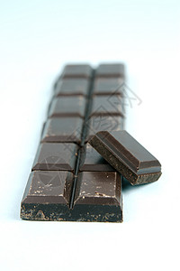 深巧克力糖果食品积木蓝色食物背景图片
