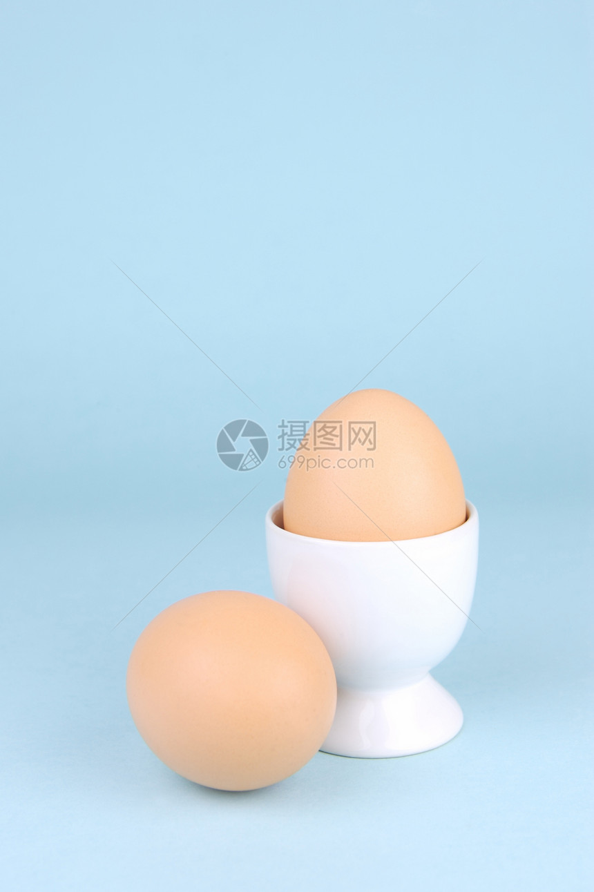 硬锅鸡蛋健康食品中心白色食物蛋黄杯子营养早餐蓝色图片