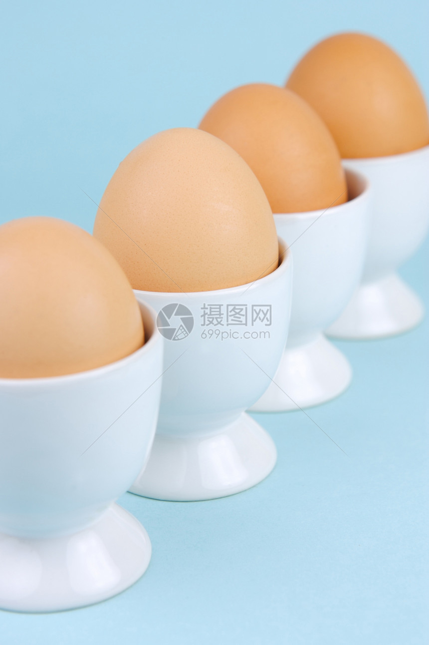 硬锅鸡蛋健康食品白色蛋黄早餐食物中心蓝色营养黄色图片
