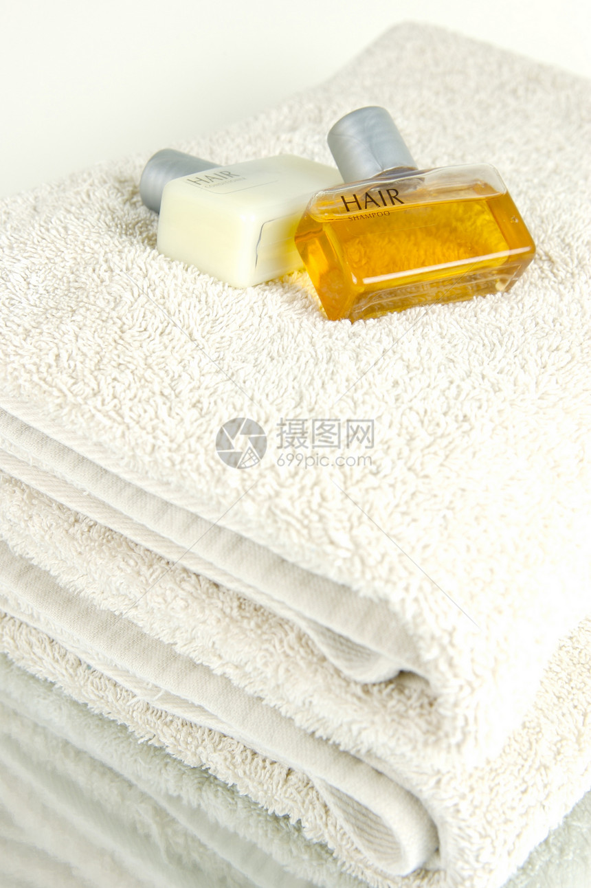 毛发和身体肥皂温泉白色瓶子酒店产品洗澡洗剂浴室毛巾图片