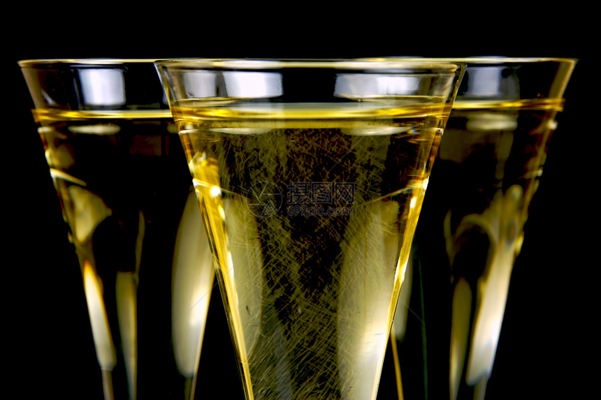 闪耀的葡萄酒白色玻璃酒精饮料庆典黑色派对眼镜图片