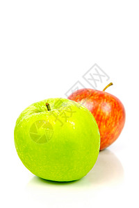 红和绿苹果白色绿色食物红色背景图片
