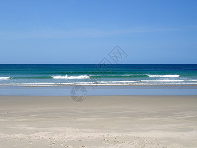 海岸图新西兰塔波图普图湾纯净海滩背景