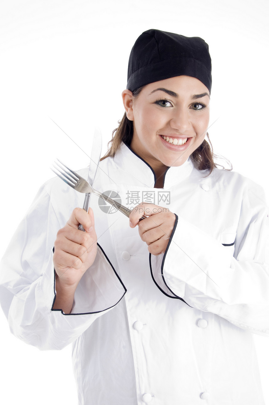 青年厨师 手持金属餐具职业烹饪黑发衣服工作室餐厅姿势成人刀具女士图片
