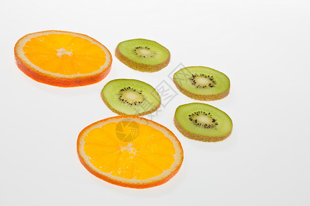 切片水果奇异果橙子绿色食物背景图片