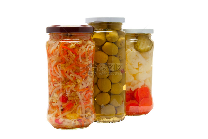 玻璃罐 在白色的背面隔绝了含加盐蔬菜的玻璃罐壁球黄瓜耳朵扇贝南瓜葫芦玻璃豆类玉米橙子图片