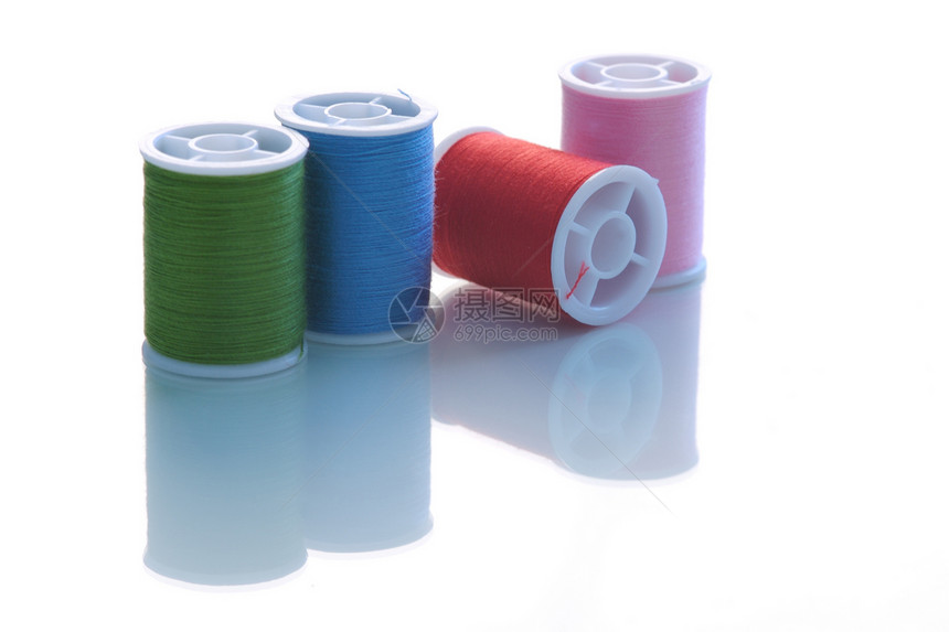 棉花手工艺主轴细绳缝纫工艺白色按钮织物纽扣纱线卷轴图片