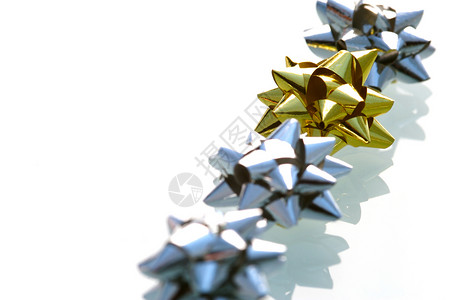 礼品包装配件金子展示生日礼物工艺白色季节星星庆典背景图片