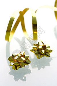 礼品包装工艺配件生日白色星星礼物季节展示金子丝带背景图片