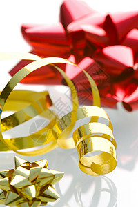 礼品包装金子丝带工艺礼物季节白色庆典星星生日展示背景图片