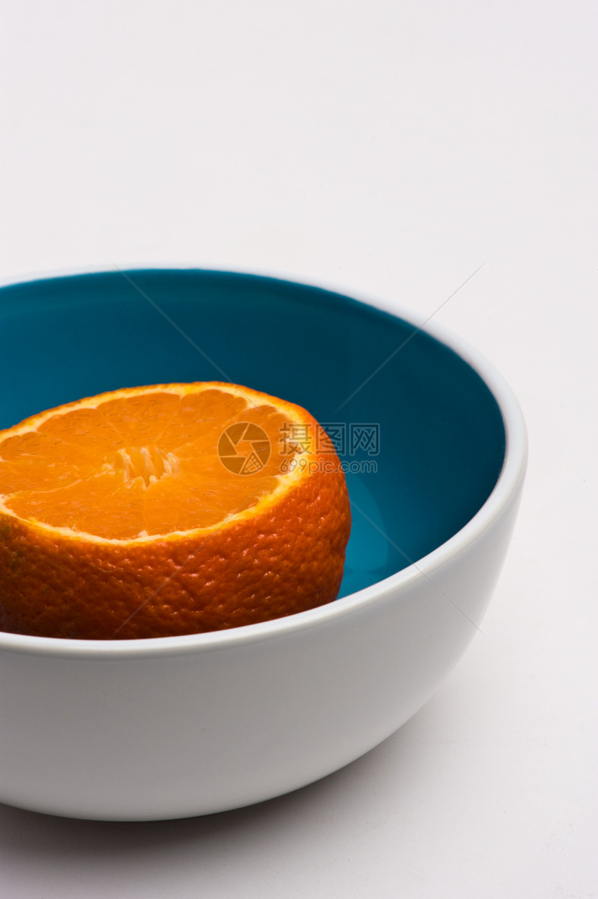 碗中的丹吉林橙子静物白色图片