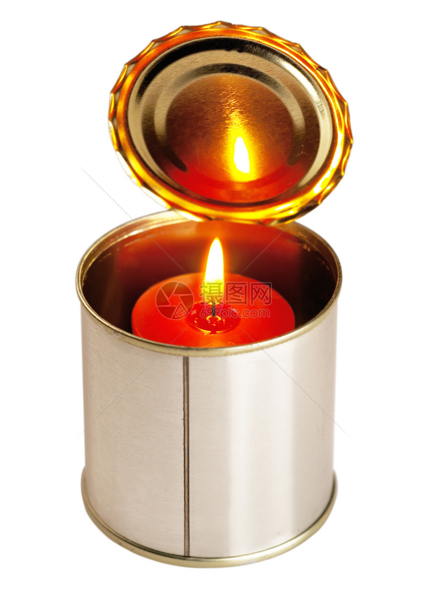 在一个锡罐上蜡烛烛光火焰罐装包装养护装罐金属庆典红色产品图片