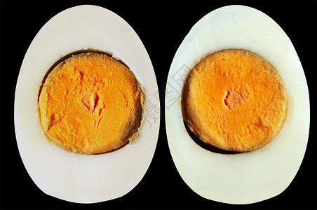 卵黄硬煮卵蛋盘子白色营养品蛋黄宏观食物雕刻蛋白黄色背景