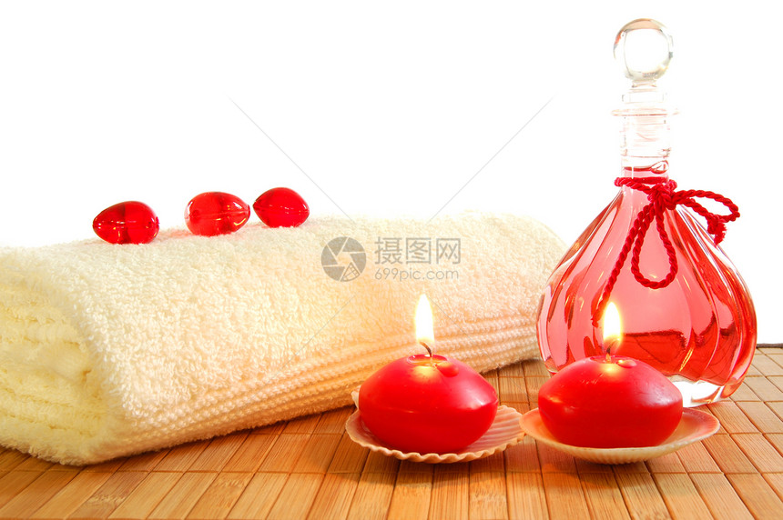 红按摩静物生命蜡烛瓶子芳香气味治疗红色疗法装饰风格韧皮图片