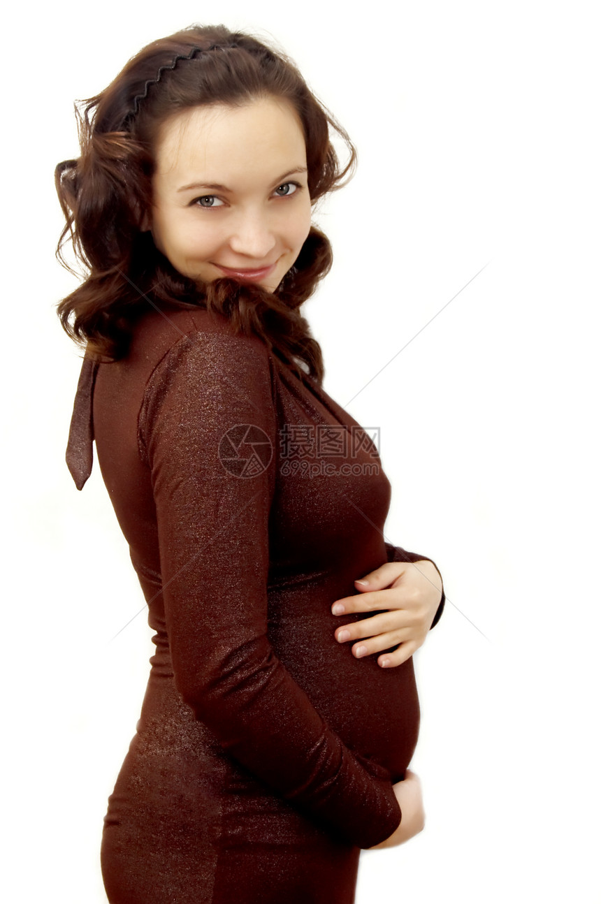微笑的孕妇成人裙子白色产妇黑发腹部父母女士母亲女孩图片