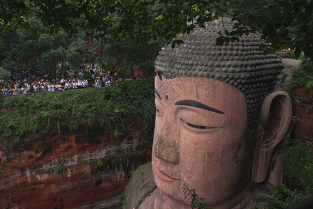 佛地标悬崖山腰历史旅行石头雕刻纪念碑爬坡雕像背景图片