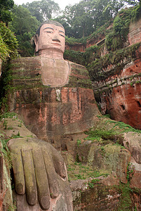 佛爬坡雕刻石头岩石洞穴山腰纪念碑宗教遗产上帝背景图片