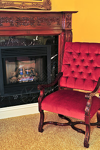 壁炉和红椅子装饰内饰房子扶手椅奢华风格家具摆设大理石雕刻背景图片