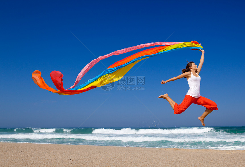 跳跃活力运动天空乐趣旅行围巾喜悦丝绸海滩海洋图片