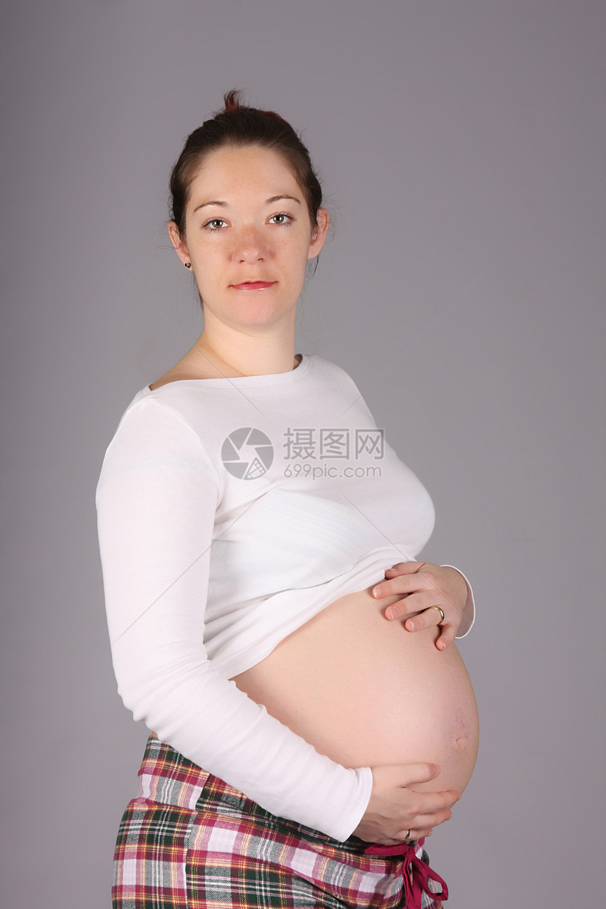 怀孕孕妇的肚子生活母性婴儿衣服女性母亲妻子女孩孩子工作室图片
