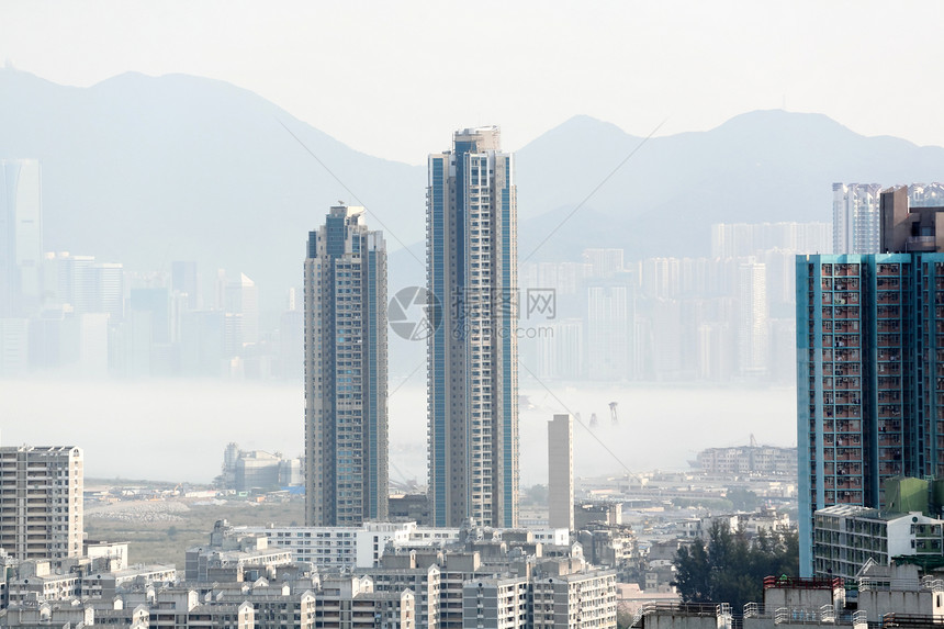 烟雾中的香港建筑天气天际天空石头历史性地标废墟太阳旅行图片